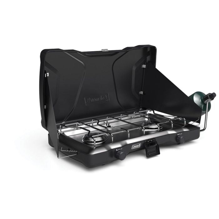 Black camping stove with a lid on a white background