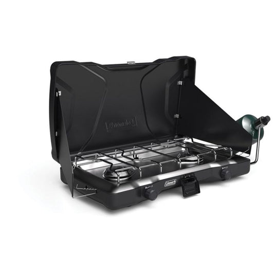Black camping stove with a lid on a white background