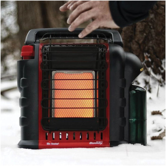 Portable heater being used in a snowy outdoor setting