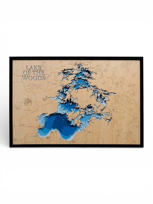 Map of Lake of the Woods with a wooden texture and blue water features, framed.